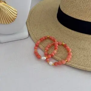 Botswana agate bracelet in coral with a centered pearl