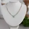 cube shaped beryl gemstone beads in 4mm ombré in color to a natural aquamarine teardrop focal pendant. The necklace is approximately 17” long and has a lobster claw closure in a fold finish